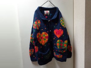 画像1: 90'S AMANO HEART TOTAL PATTERN HEAVEY WOOL KNIT CARDIGAN（アマノ ハート総柄仕様 ヘヴィー ウール ニット カーディガン）（XL位）