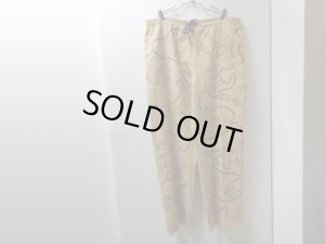 画像1: 80'S michele HAND PAINT TOTAL PATTERN POLYESTER × RAYON EASY PANTS（ミシェル 手描き顔総柄仕様 ポリエステル × レーヨン混紡 イージーパンツ）MADE IN USA（実寸W33〜38 × L28.5）